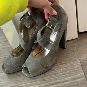 Michael Kors sued grey heels